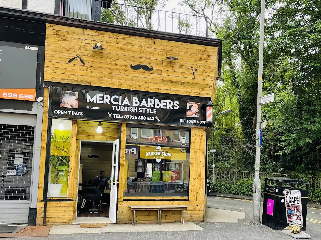 Mercia Barbers timber shopfront on Clarkston Road, Cathcart